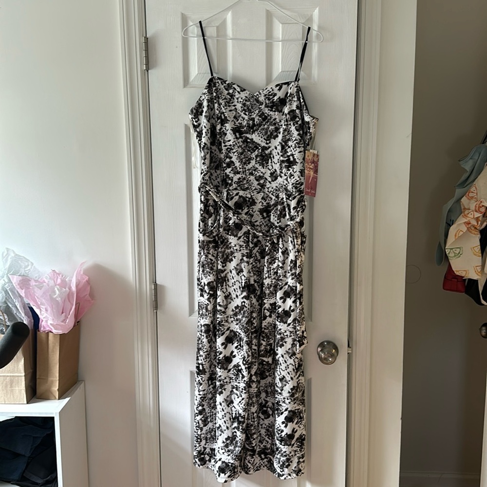 Black and white tie dye printed women’s jumpsuit with zipper, belt and pockets